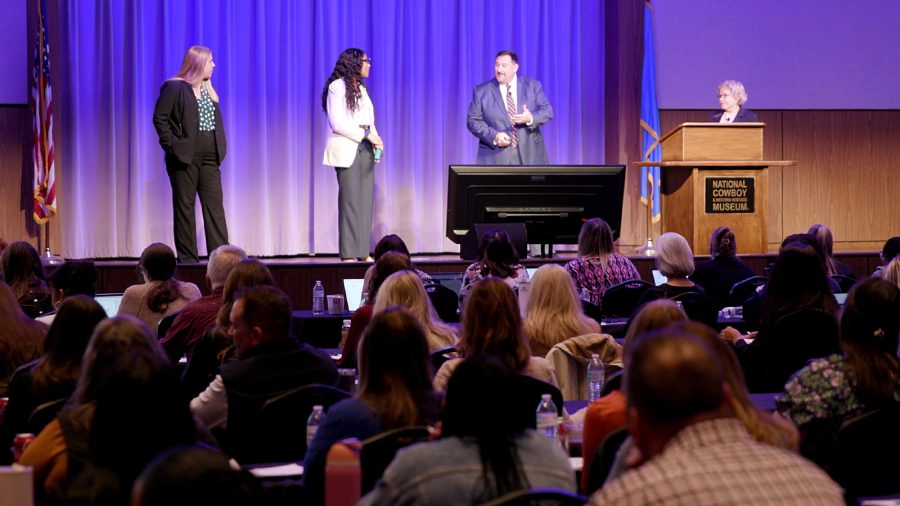 McAfee & Taft lawyers Kristin Simpsen, Kate Dodoo, Nathan Whatley, and Roberta Fields, answering frequently asked questions during the morning presentation at EmployerLINC25 on April 2, 2025 at the National Cowboy & Western Heritage Museum.