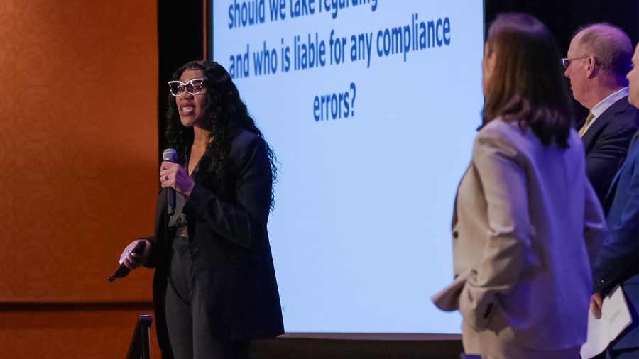 McAfee & Taft immigration lawyer Kate Dodoo answer attendee questions with employment lawyers Courtney Bru, Kirk Turner and Jake Crawford looking on, at the EmployerLINC25 seminar on April 4, 2025 at Renaissance Tulsa Hotel & Convention Center.