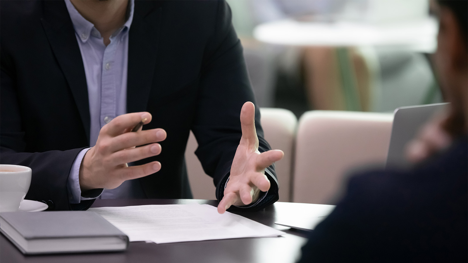 lawyer discussing lawsuit with client