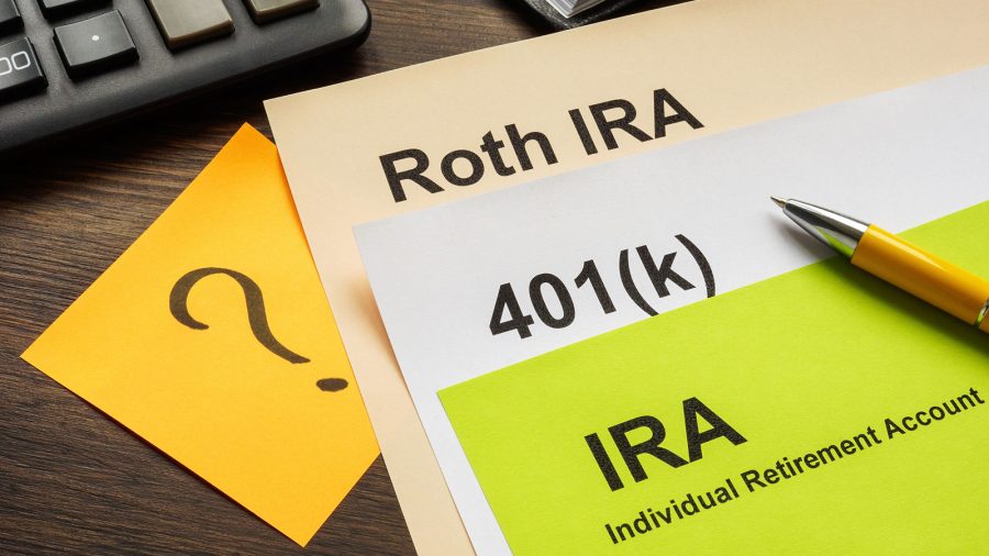 Documents with Retirement plans IRA, 401k and Roth IRA for choosing