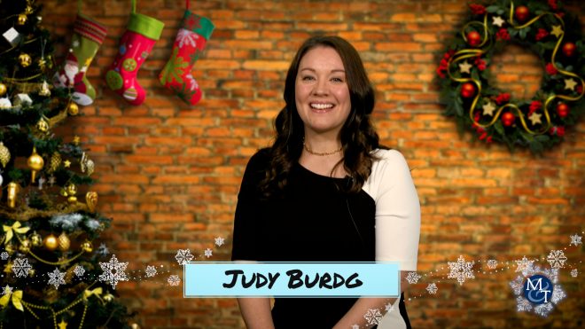 Photo of Judy Burdg telling her favorite holiday memories