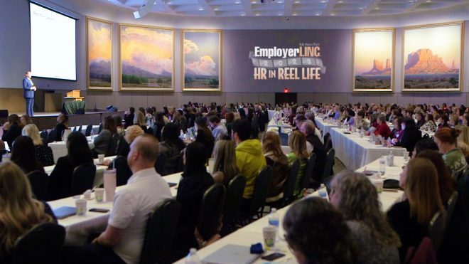 Photo of audience and presenter from the EmployerLINC 2023 seminar in Oklahoma City at the National Cowboy & Western Heritage Museum.