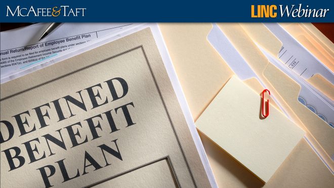 Photo of documents and a note related to a Defined Benefit Plan.